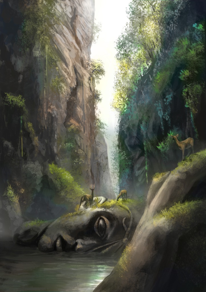 A canyon with a fallen statue head.
